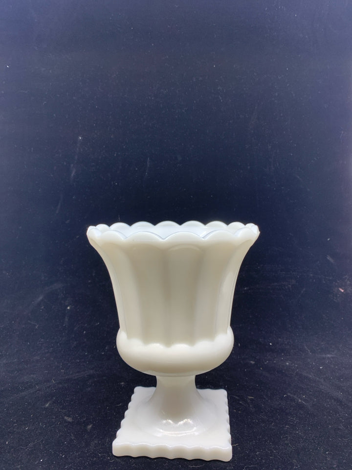 VTG FOOTED MILK GLASS VASE.