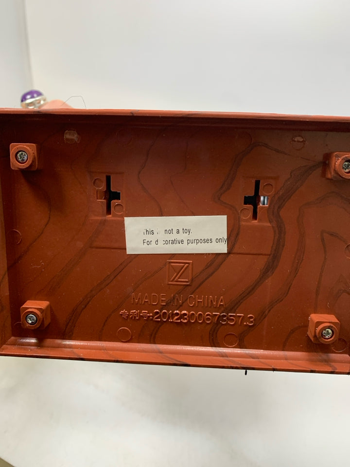PLASTIC SEWING TABLE W/ MACHINE MUSIC BOX MOVING PIECES.