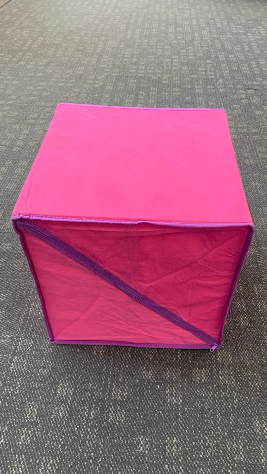 STACKED PINK & PURPLE COLLAPSING BINS.