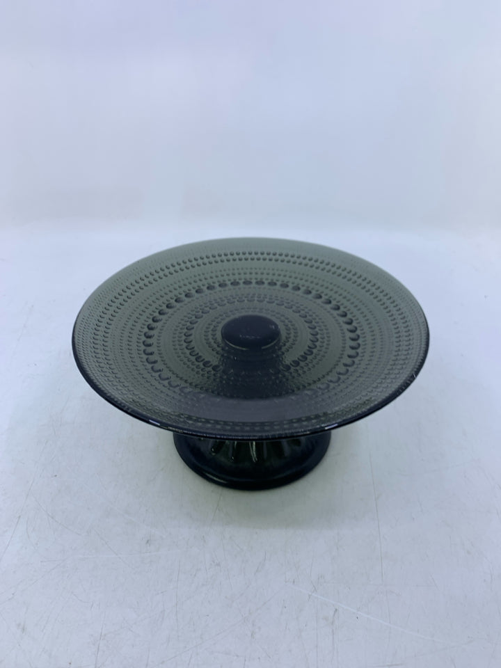 BLACK GLASS FOOTED CAKE STAND W/ EMBOSSED BEADING.