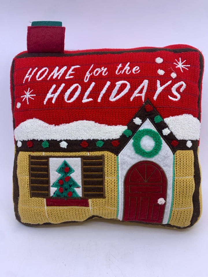 "HOME FOR" RED ACCENT SWEATER PILLOW.