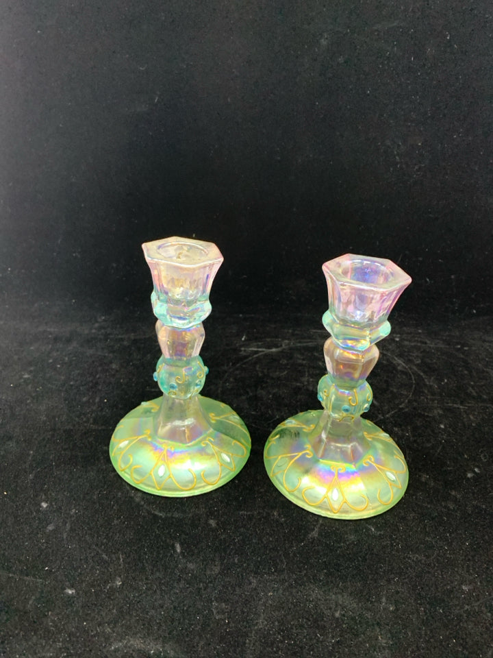2 PASTEL COLORED GLASS CANDLE HOLDERS.