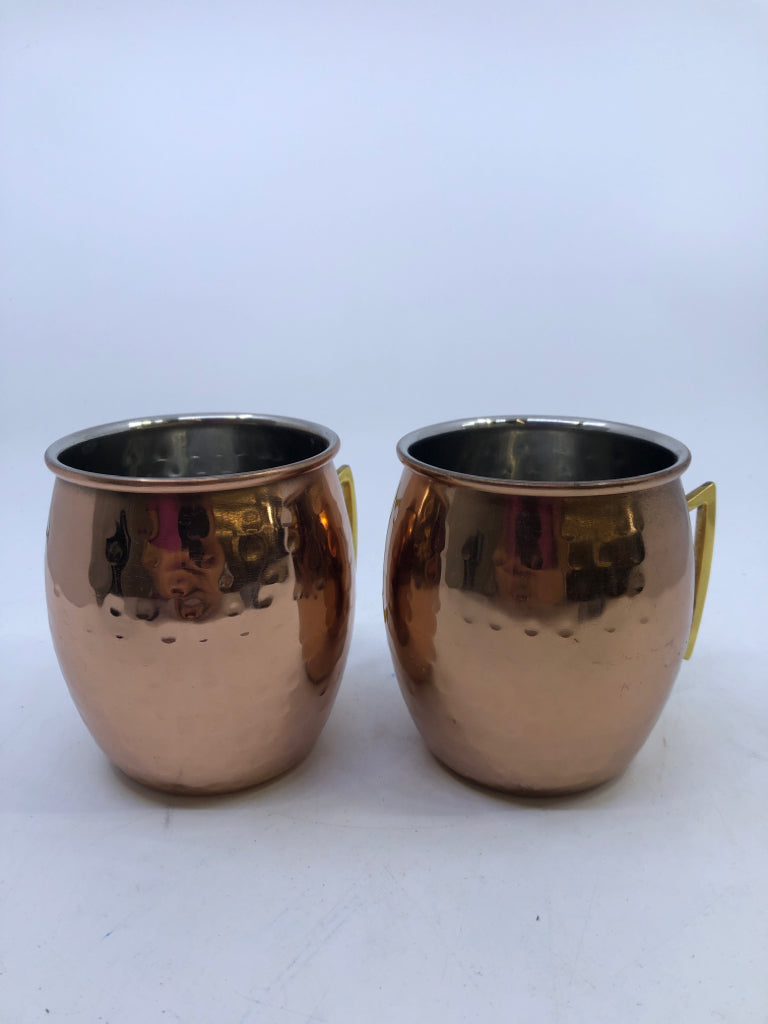 2 COPPER HAMMERED MUGS.