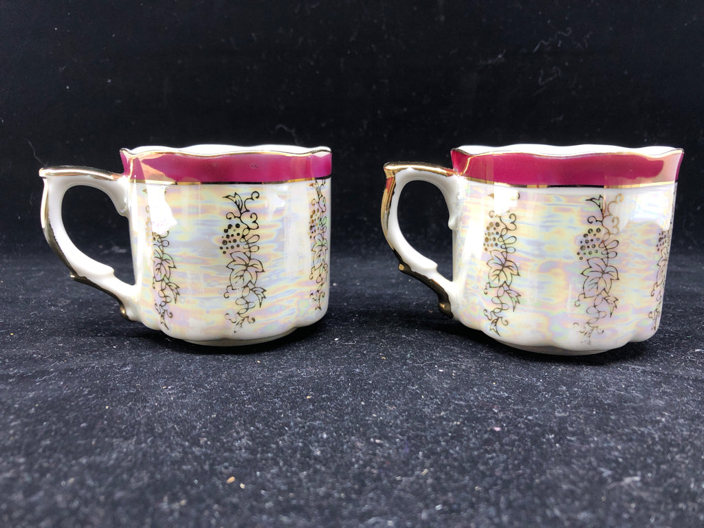 2 VTG SMALL TEA CUPS W/VICTORIAN COUPLE.