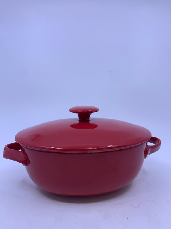 RED STONEWARE OVAL BAKING DISH W/ LID AND HANDLES.