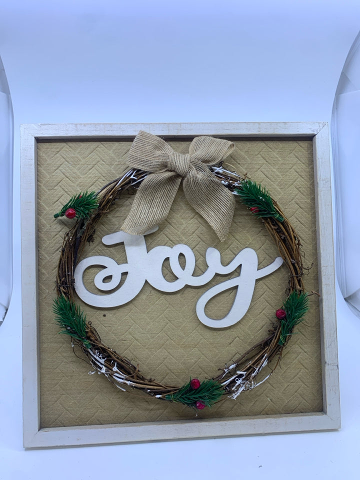 WHITE FRAMED JOY STAND OR WALL HANGING.