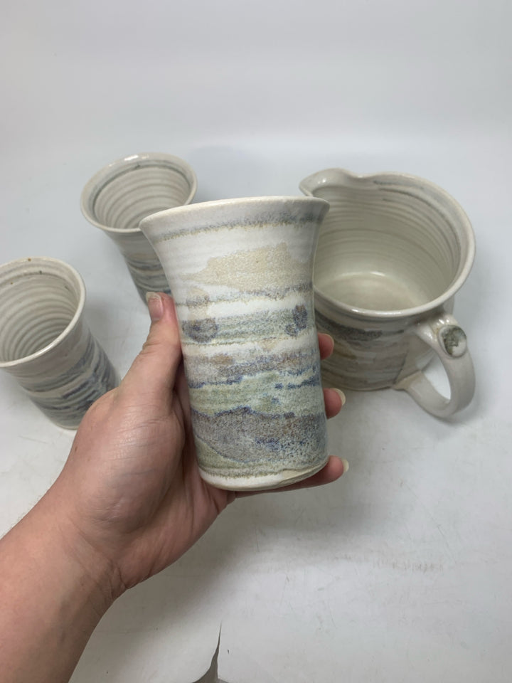 4 PC MULTI COLORED STRIPED POTTERY CUPS W/ PITCHER.