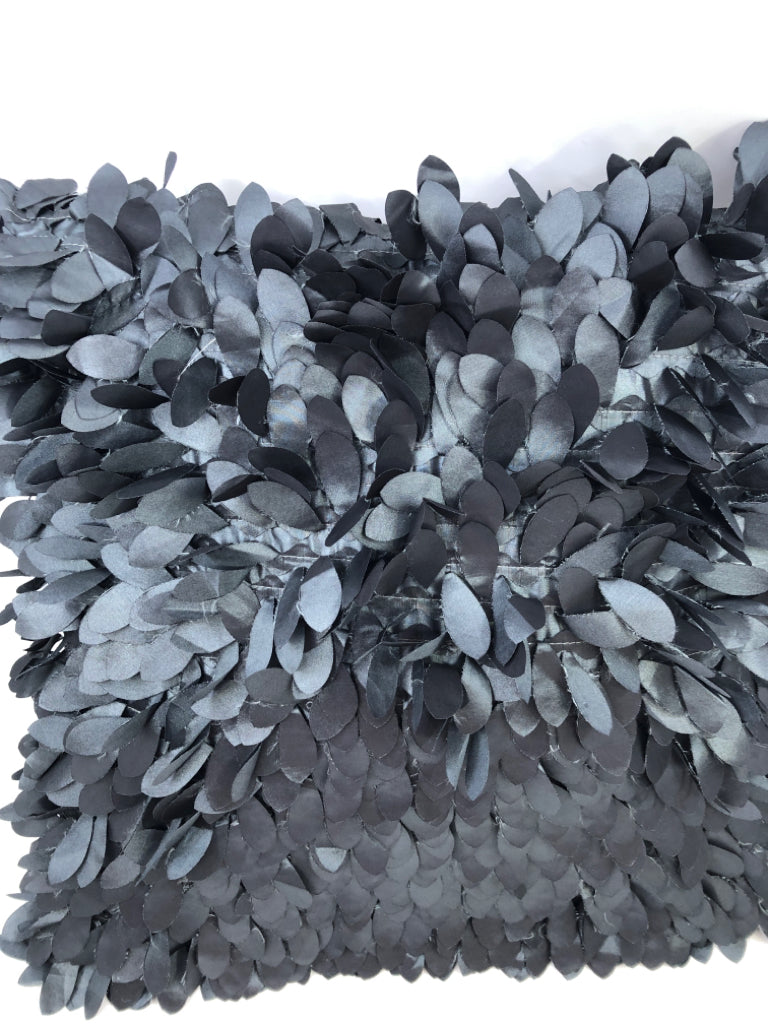 BLACK TEXTURED ACCENT PILLOW.