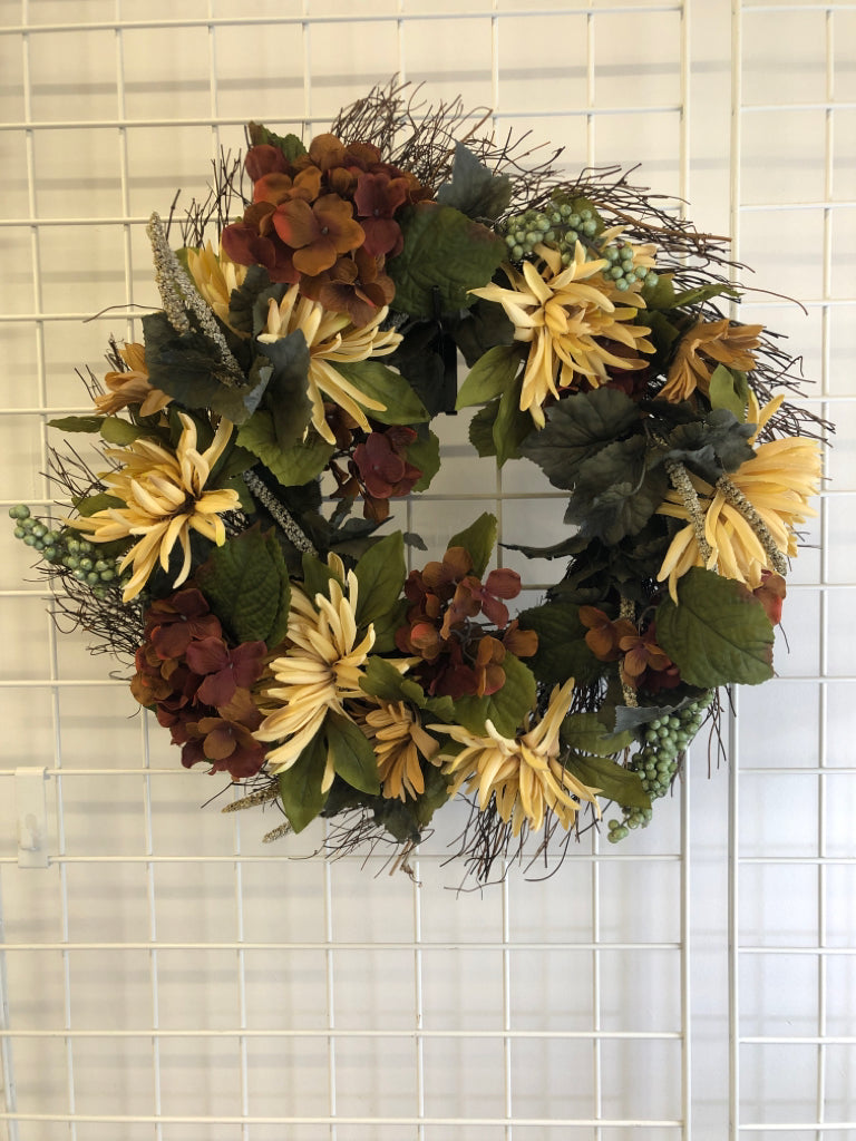 TAN/BROWN FLORAL WREATH W/GREEN LEAVES, BERRIES.