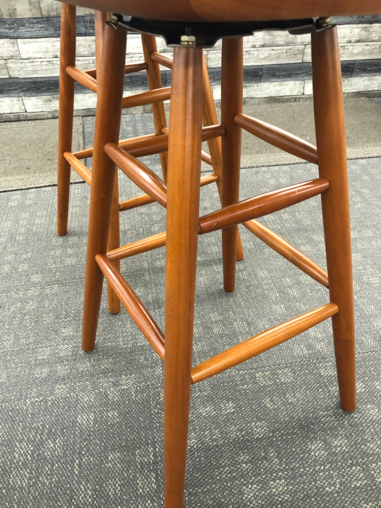 2 TALL WOOD SWIVEL BAR STOOLS.