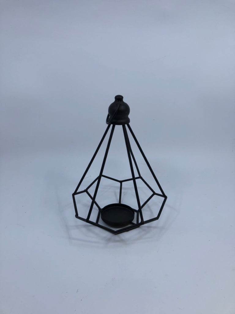BROWN CAGE PRISM SHAPE TEA LIGHT HOLDER.