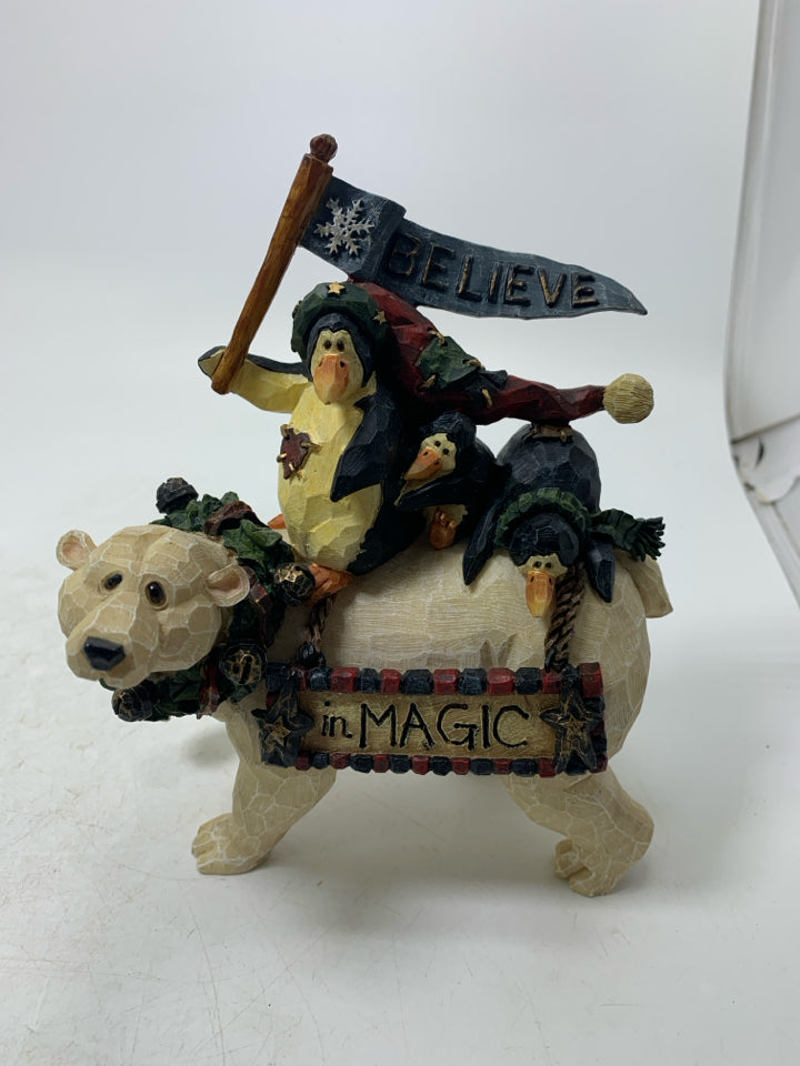 RESIN PENGUINS RIDING A POLAR BEAR CARVERS CHOICE.