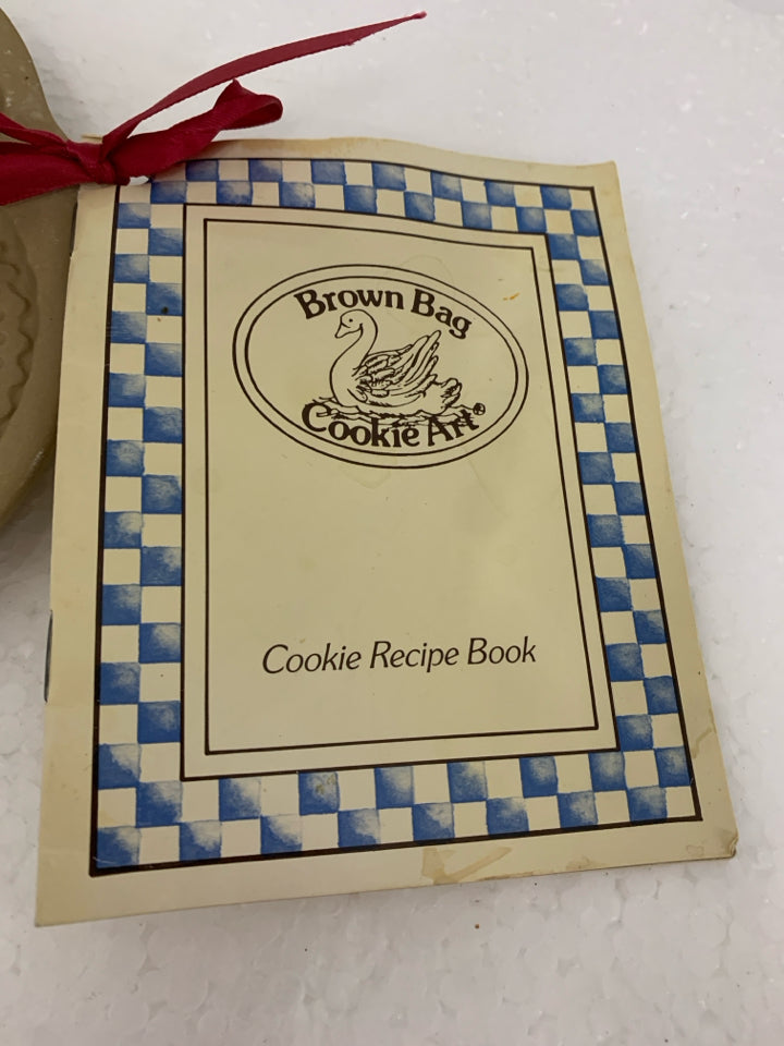 HEART SHAPED STONEWARE COOKIE PRESS BROWN BAG.