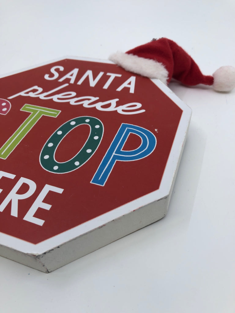 SANTA PLEASE STOP STANDING SIGN.