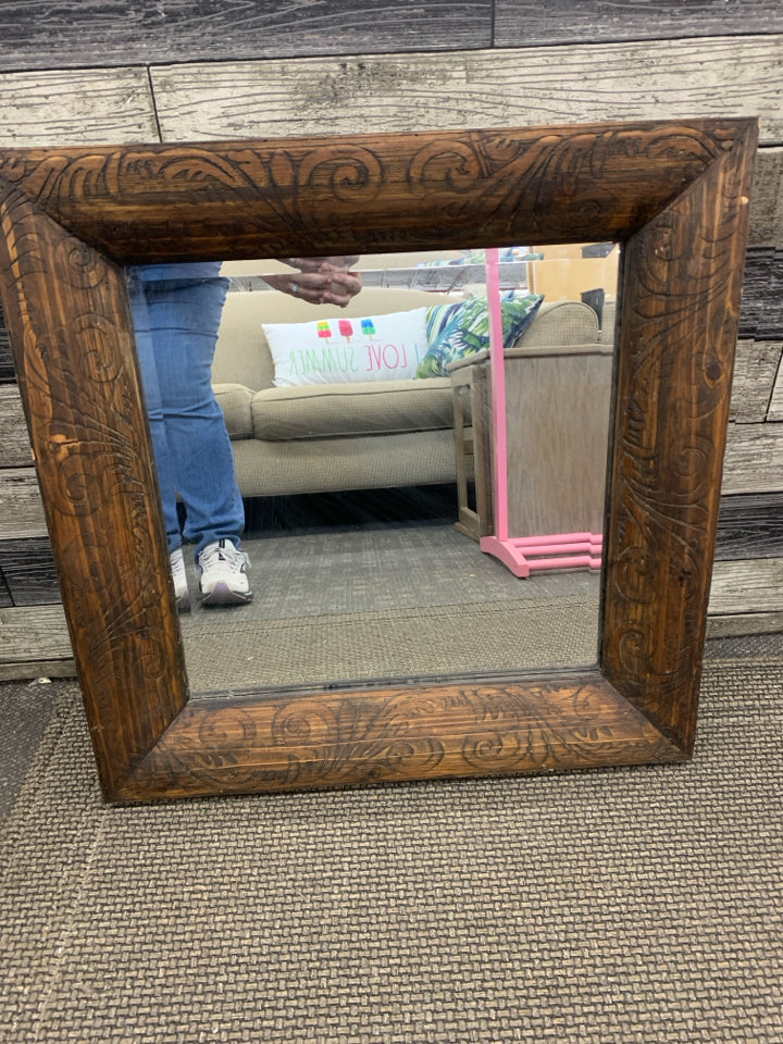 DARK BROWN CARVED WOOD SQUARE FRAMED MIRROR.