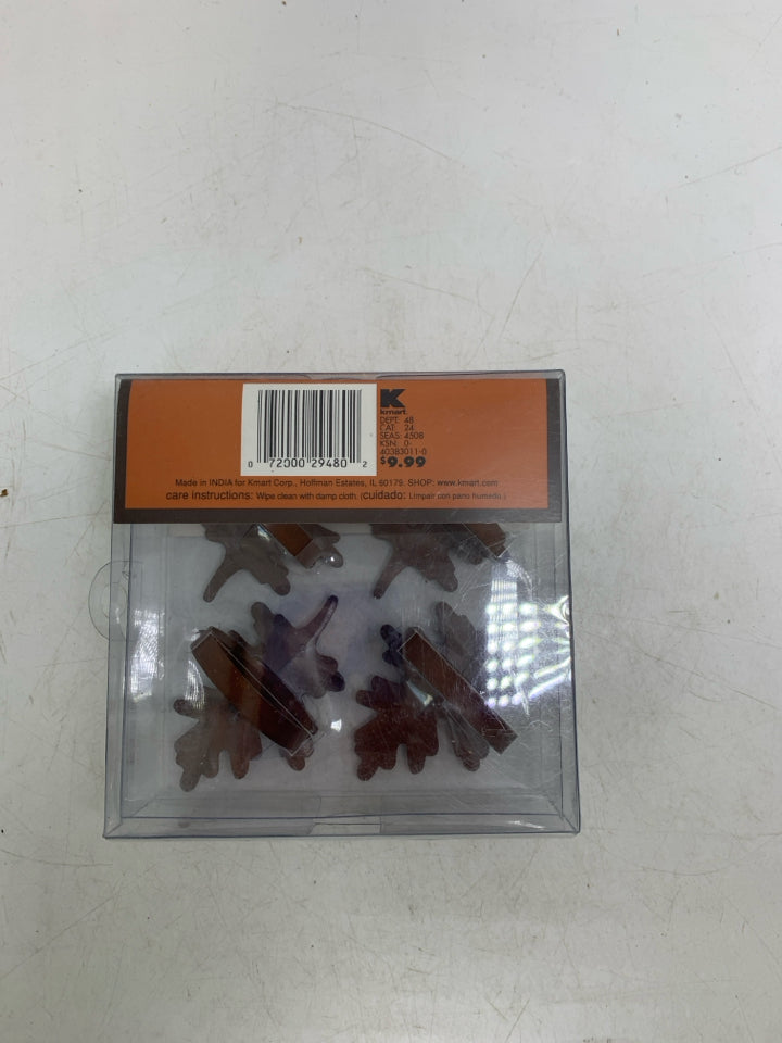 NIP 4 METAL ANTIQUE LEAF NAPKIN RINGS.