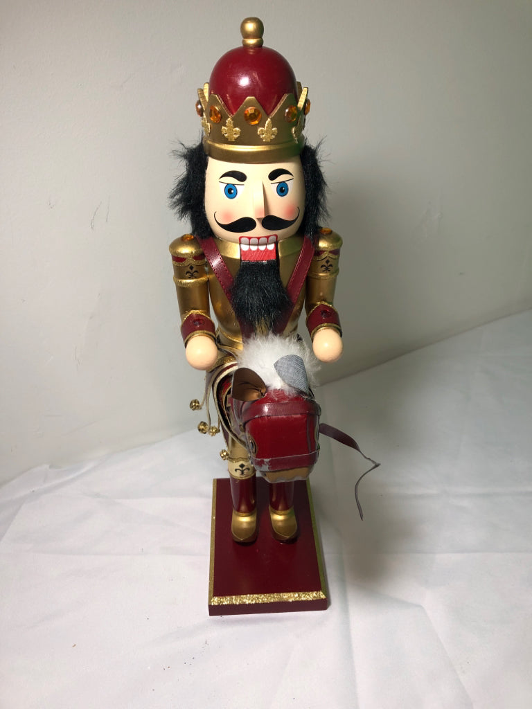 RED AND GOLD NUT CRACKER .