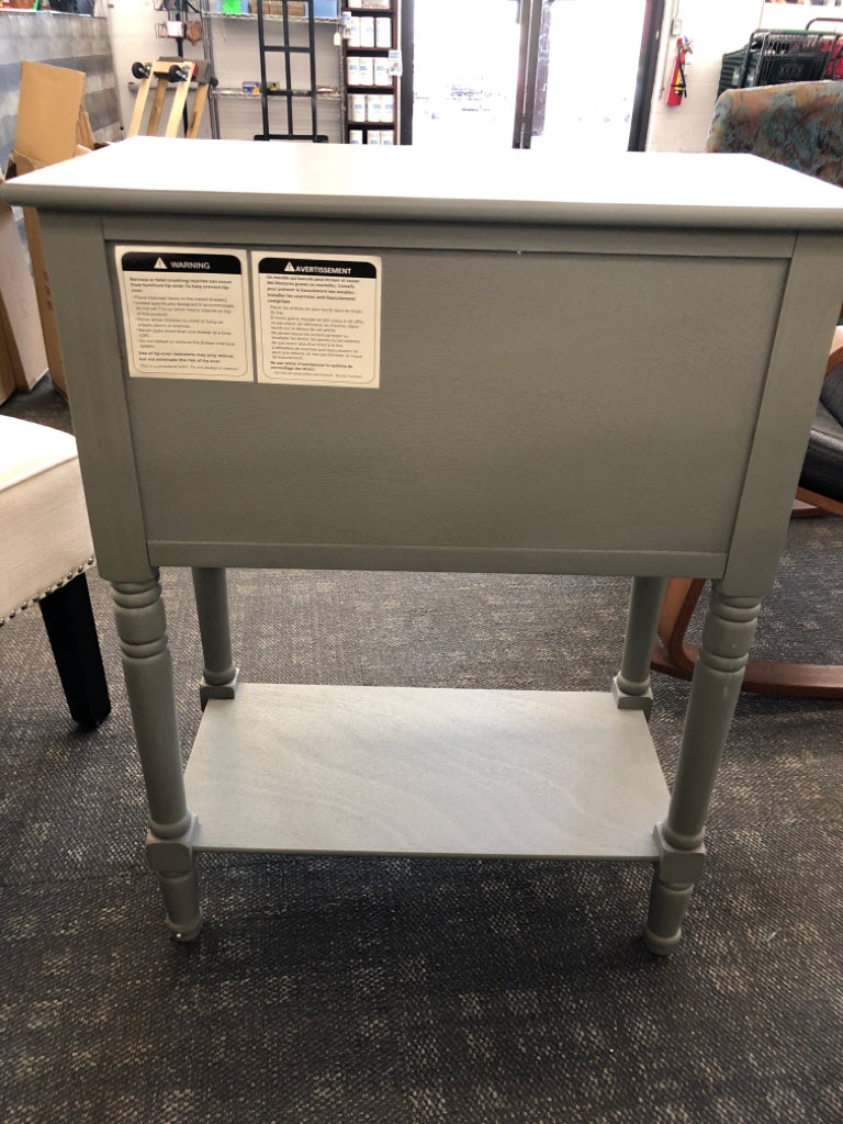 GREY SIDE TABLE W/ 3 DRAWERS.