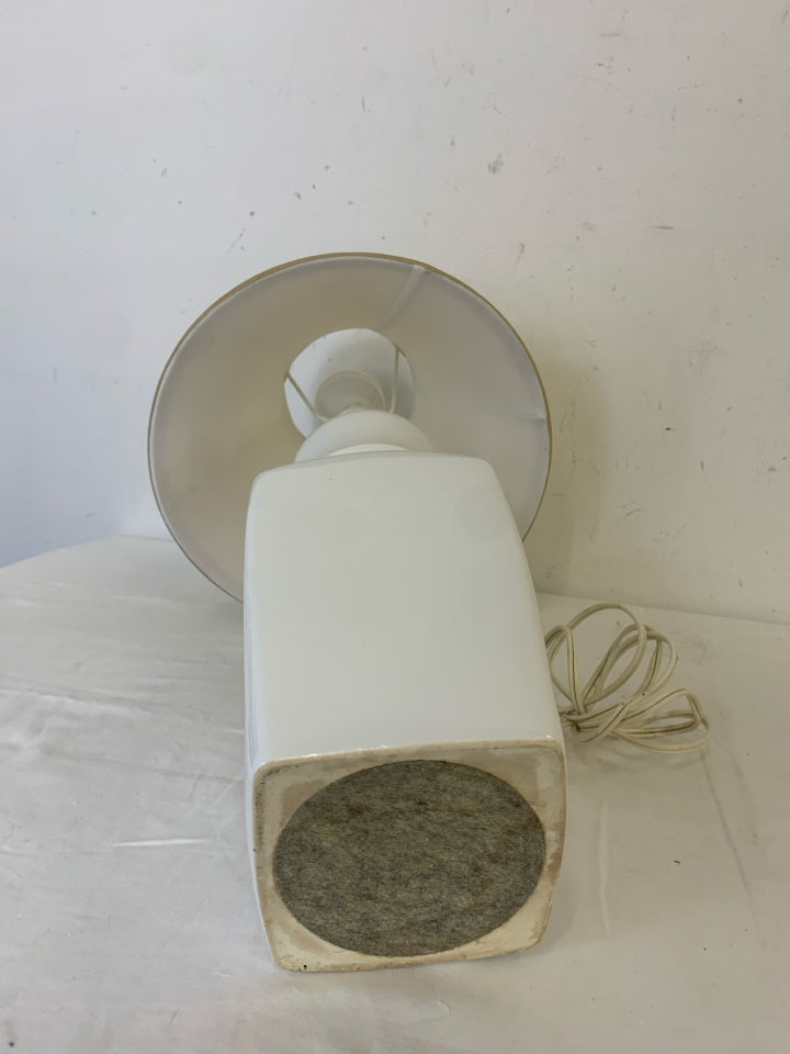 WHITE BASE LAMP W TAN SHADE.