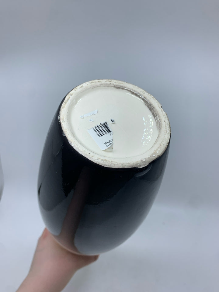 WHITE/BLACK CERAMIC TALL BUD VASE.