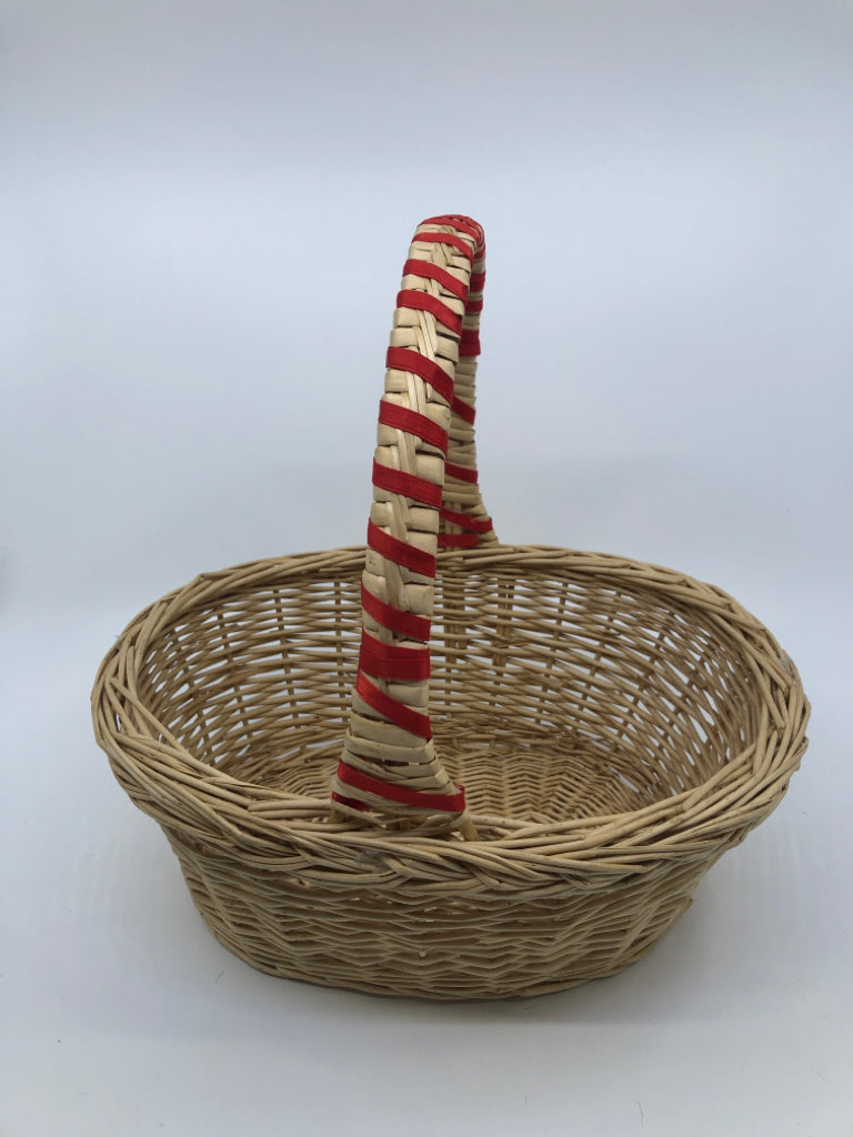 BLONDE WICKER BASKET W/HANDLE AND RED RIBBON.