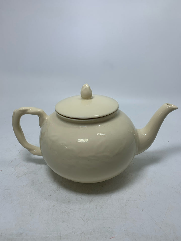 TWISTED HANDLE EMBOSSED LEAVES TEAPOT.