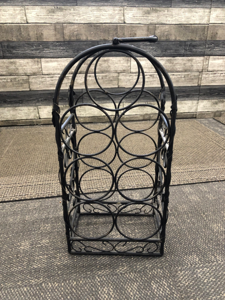 BLACK METAL ARCH SHAPED WINE RACK.