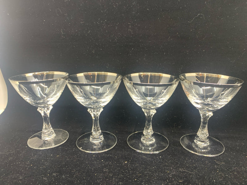 4 SMALL GLASSES W/ SILVER RIM.