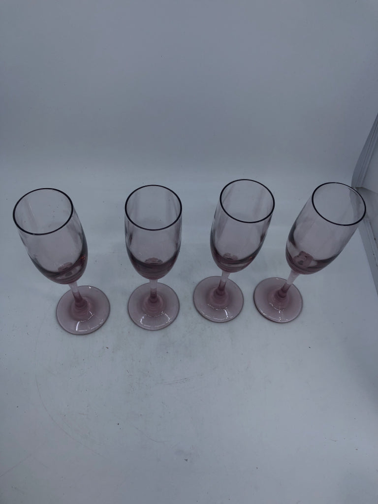 4 PINK TINTED CHAMPAGNE FLUTES.