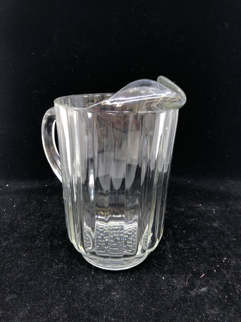 CLEAR RIBBED GLASS PITCHER.