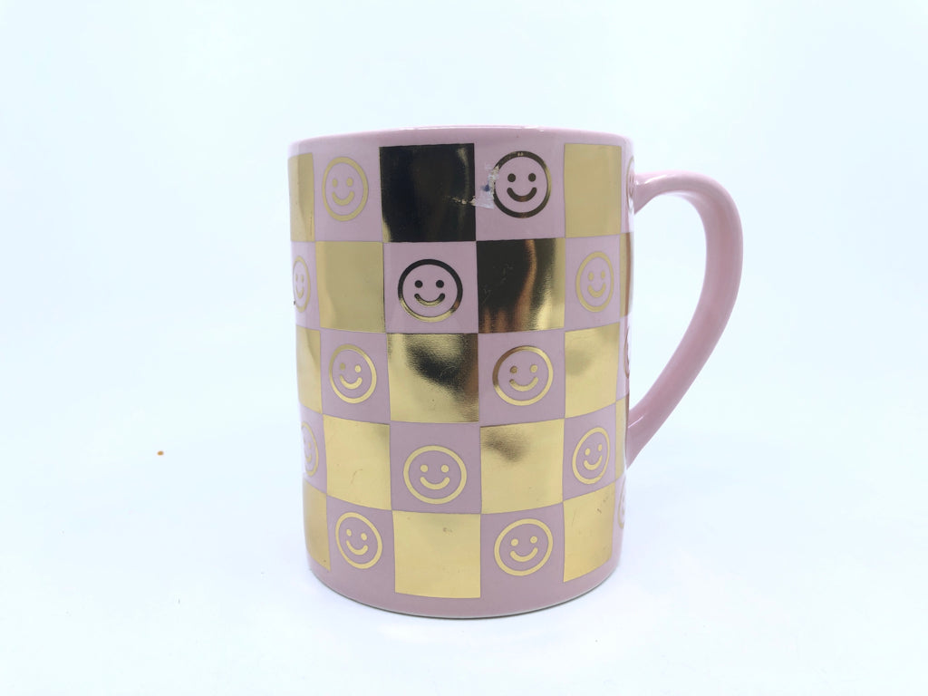 PINK/GOLD SMILEY FACE MUG.