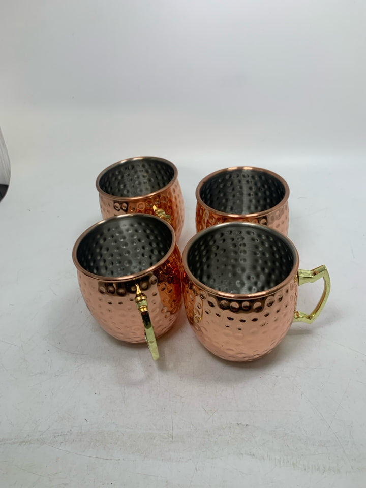 4 COPPER COLORED HAMMERED MOSCOW MULE MUGS.