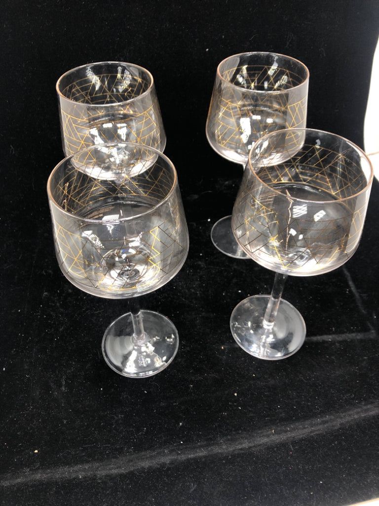4 GEOMETRIC GOLD WINE GLASSES.