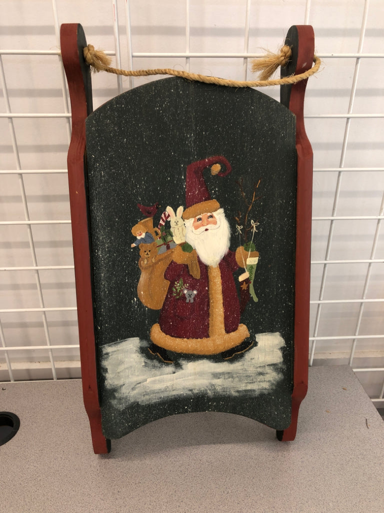 PAINTED VTG SANTA LOOK SLEIGH WALL HANGING.
