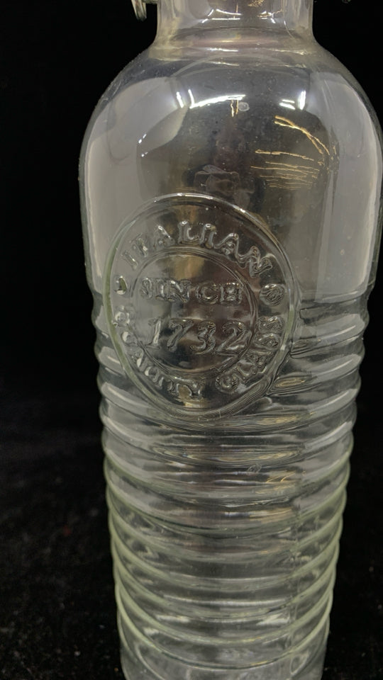 CLEAR RIBBED GLASS BOTTLE W/STOPPER.