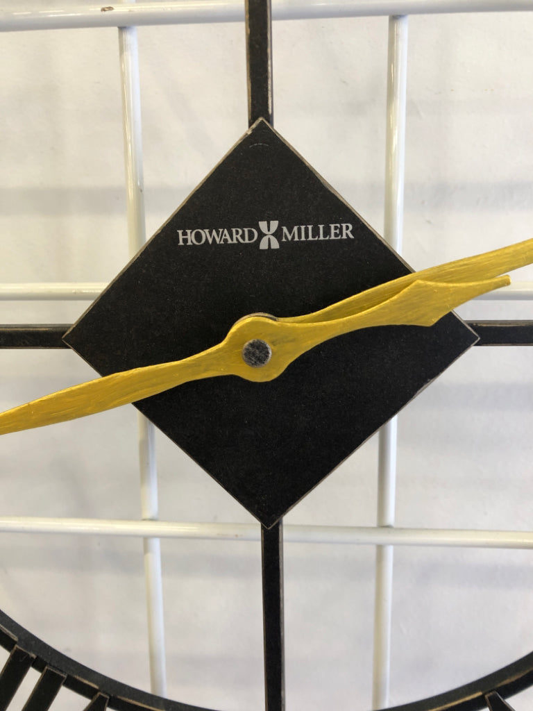 BLACK + GOLD METAL CLOCK.