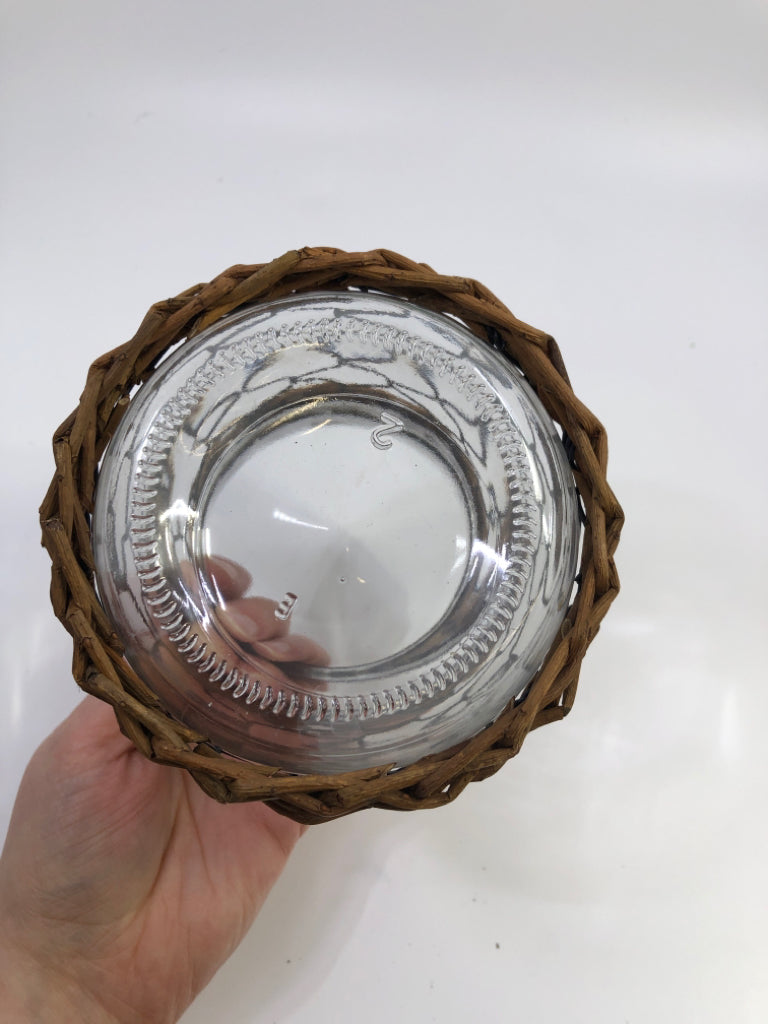 CHICKEN WIRE COVERED GLASS VASE.