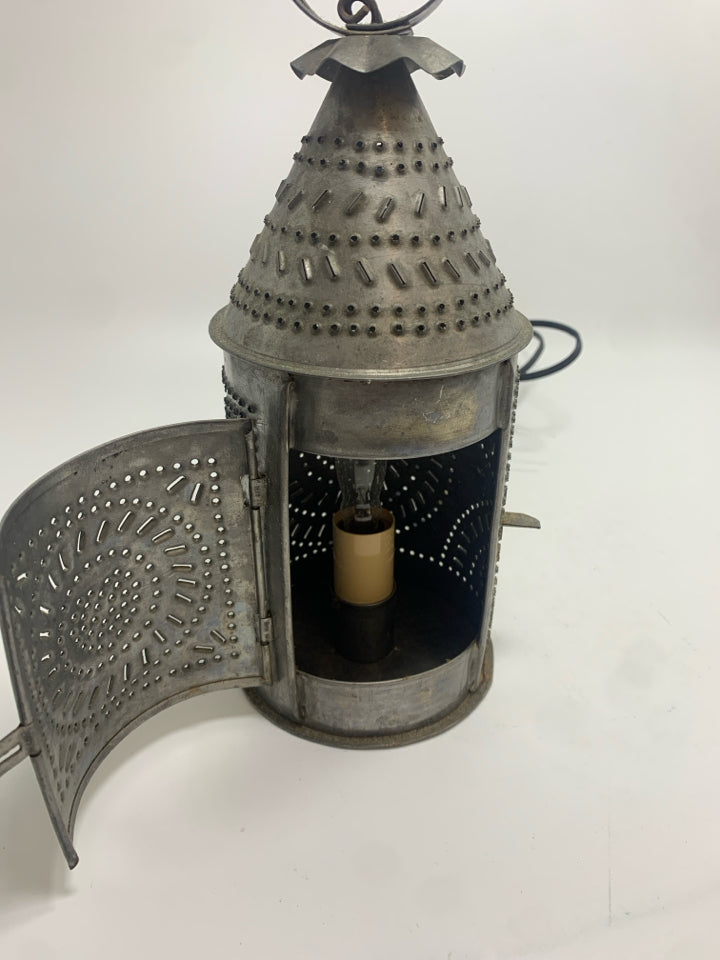 PUNCHED SILVER METAL LANTERN.