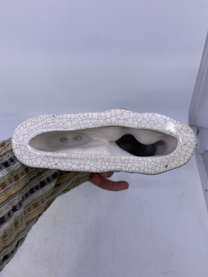 SNOWMAN PULLING HIS KIDS IN SLED WAVING.