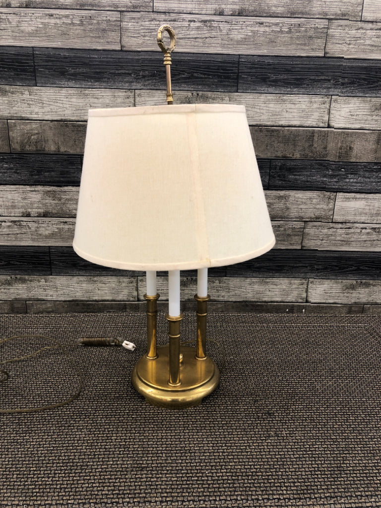 BRASS LAMP W/3 PILLARS AND CREAM SHADE.