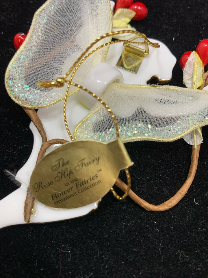 THE ROSE HIP FAIRY PORCELAIN ORNAMENT.