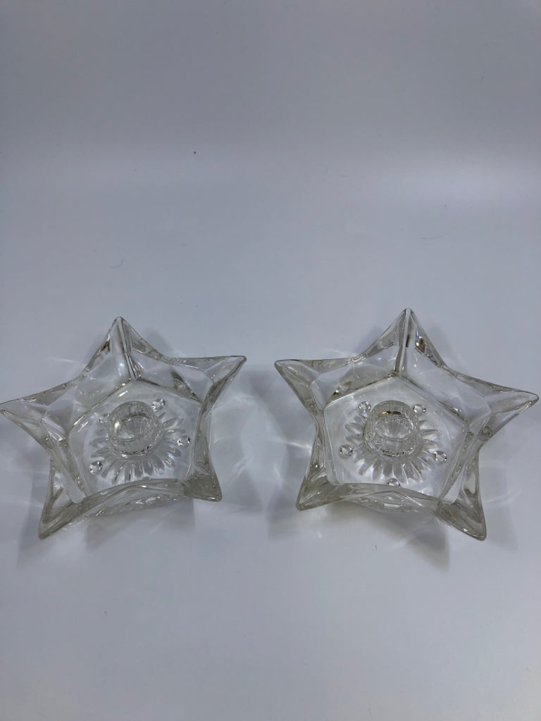 2PC GLASS STAR CANDLE HOLDERS.