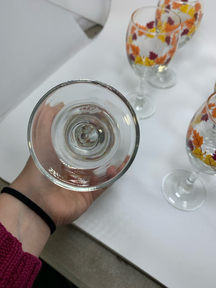 6 CLEAR WINE GLASSES W/ PRINTED FALL LEAVES.