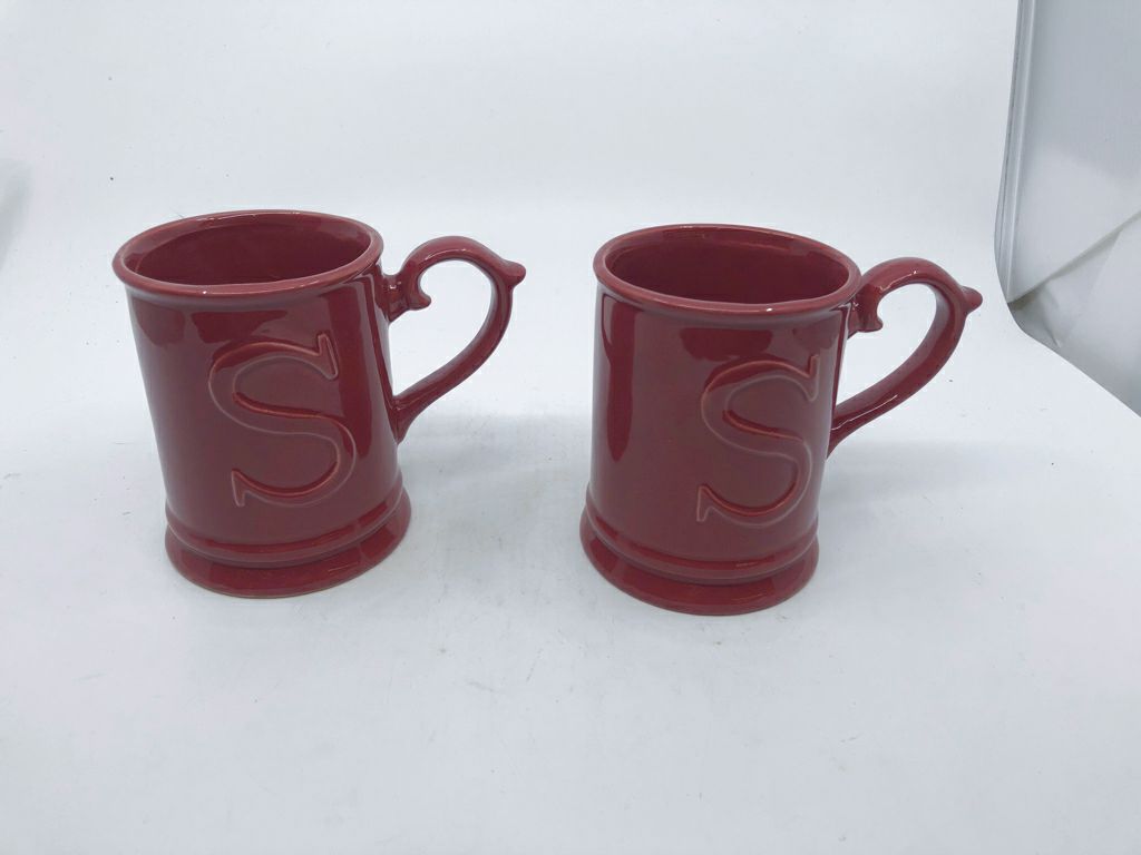 2 RED MONOGRAMMED "S" MUGS.