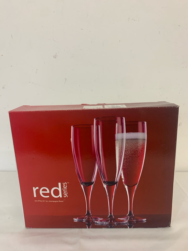 4 RED SERIES CHAMPAGNE FLUTES.