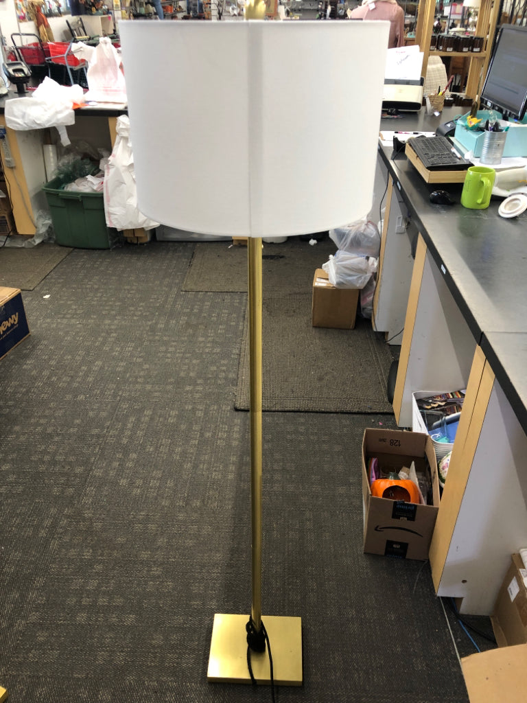 TALL GOLD FLOOR LAMP.