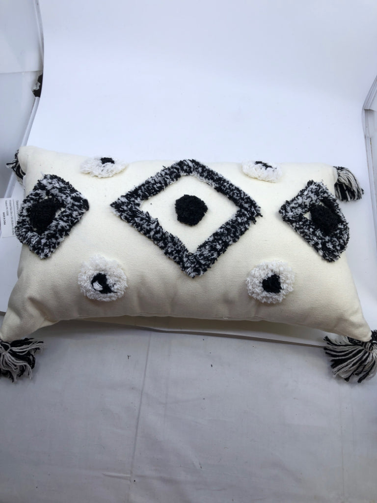 BLACK/WHITE BOHO RECTANGLE PILLOW W/ TASSELS.