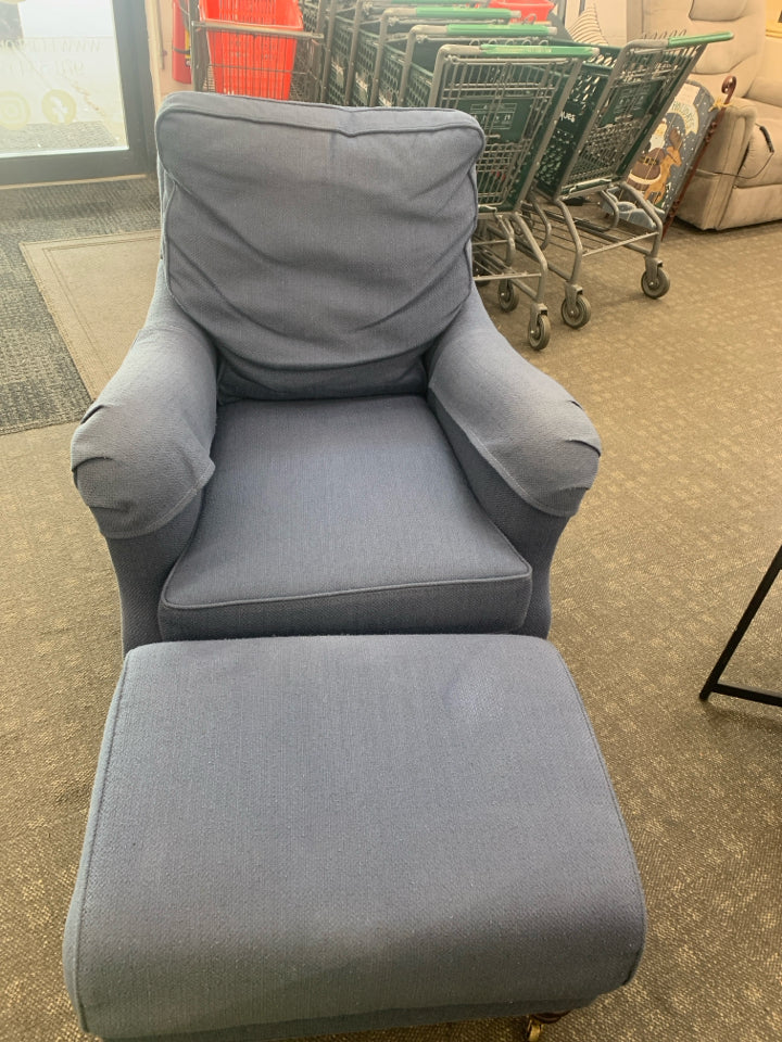 NAVY BLUE ACCENT CHAIR W/ OTTOMAN WHEELS.