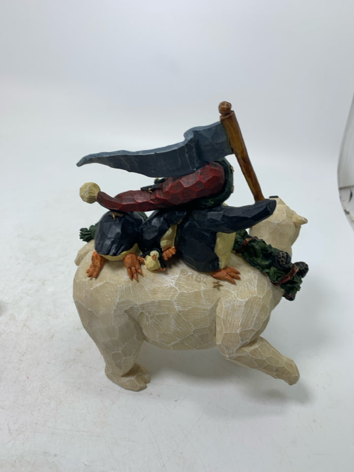 RESIN PENGUINS RIDING A POLAR BEAR CARVERS CHOICE.