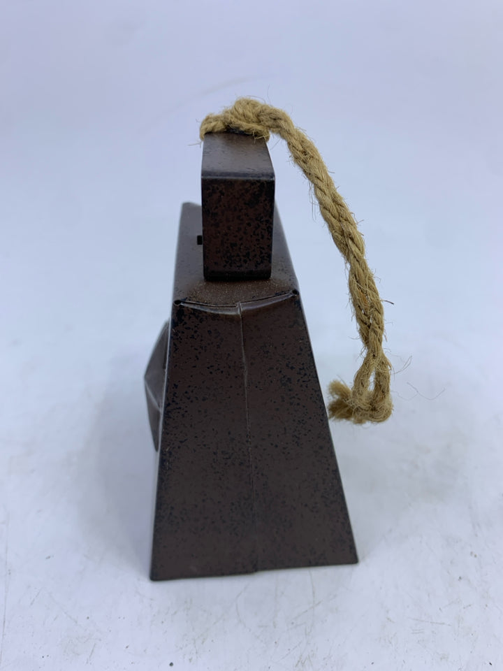 BROWN METAL BELL W/ STAR ORNAMENT.